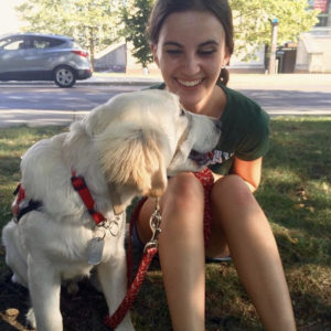 Roku, animal-assisted therapy dog, and Erika Baldwin, with The Ohio State University’s (OSU) Aphasia Initiative.