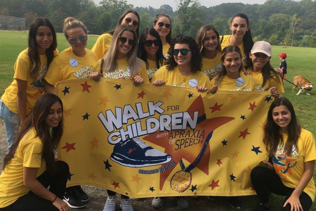 St. John's University, Staten Island, NSSLHA chapter members participating in the Staten Island Speaks Up! walk to raise awareness about childhood apraxia of speech.