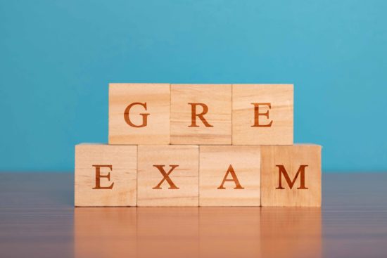 Letter blocks spell out GRE Exam