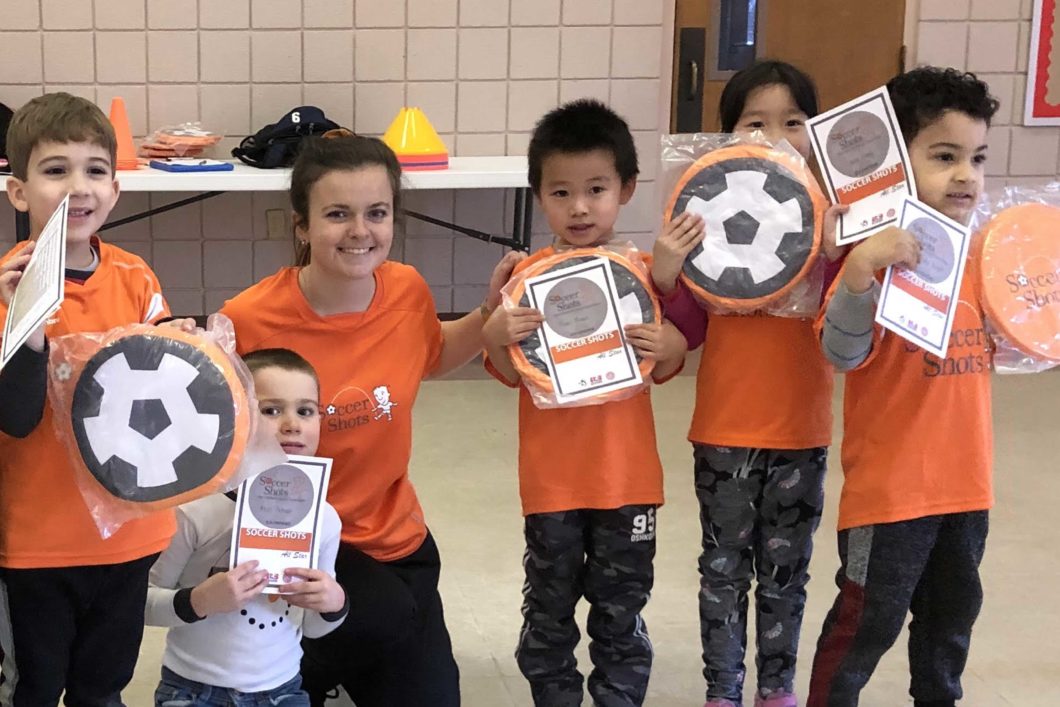 Holly Bowman with student soccer players