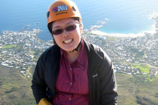 Miya Wilson repelling from Table Mountain, in South Africa