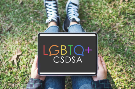 LGBTQCSDSA logo on ipad screen (student holding)